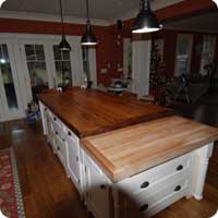 Reclaimed barn oak island table and hardwood maple butchers block
